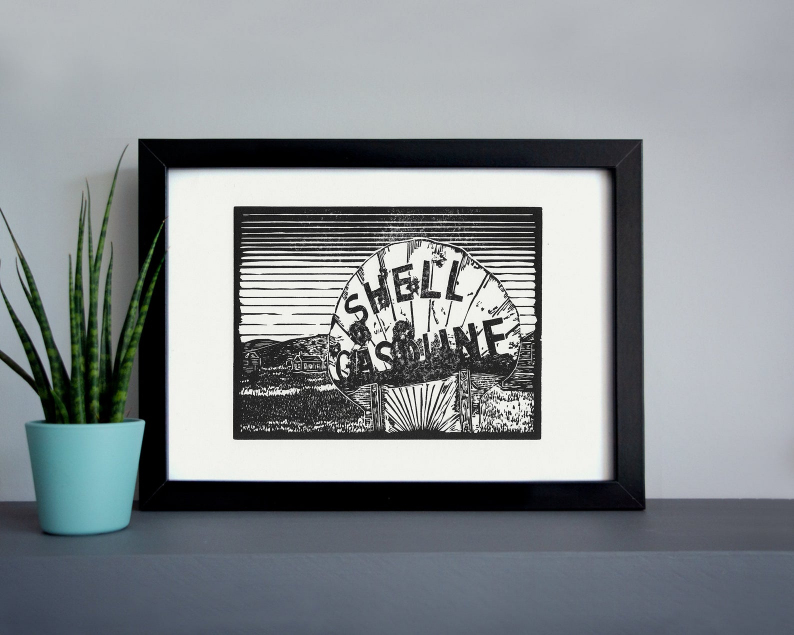 Ghost town gas sign linocut print framed