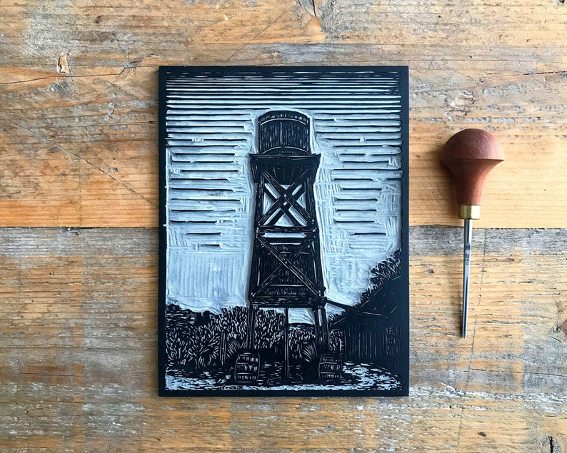 Ghost town water tower linocut print block