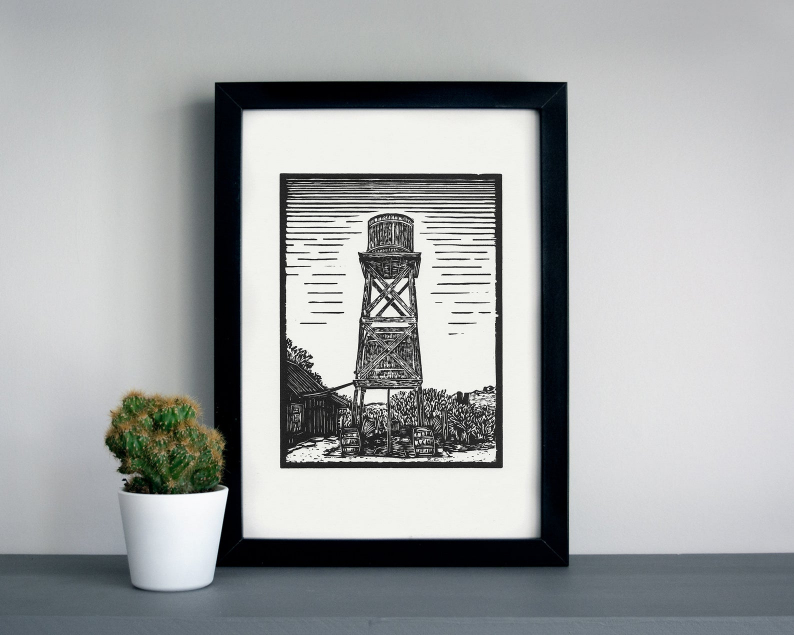 Ghost town water tower linocut print framed