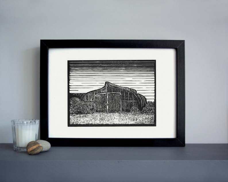 Lindisfarne boat shed linocut print framed
